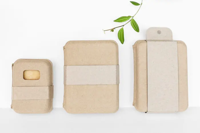 chipboard sleeve and bands for molded pulp clamshell boxes